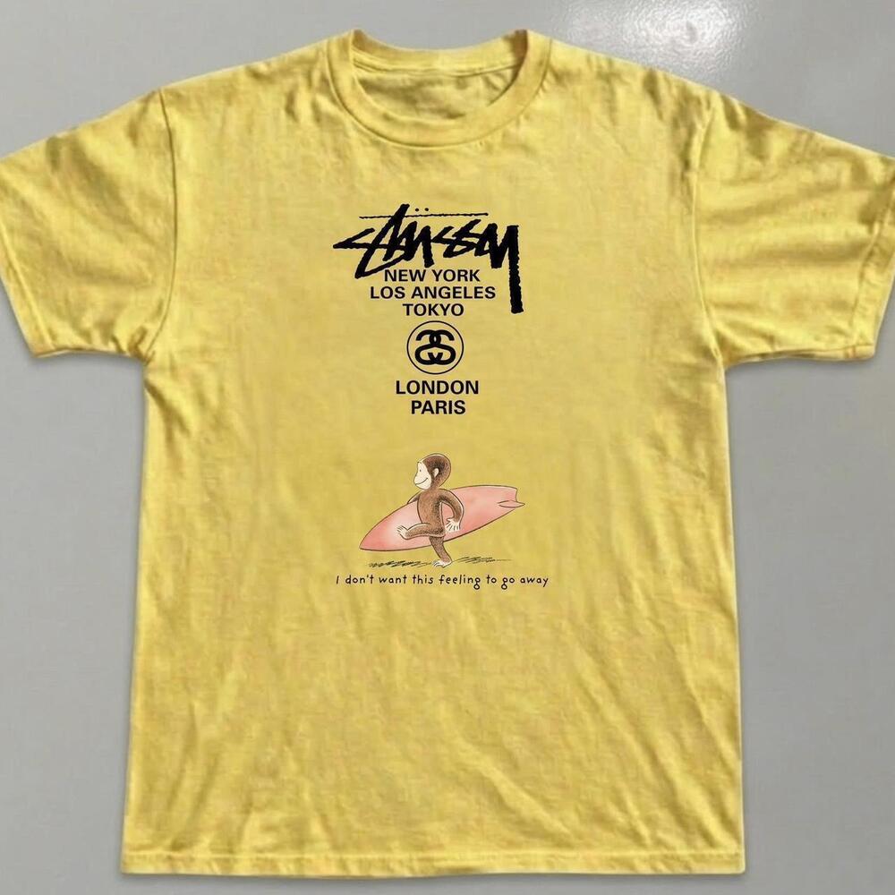 Yellow Stussy Graphic Tee With A Surf Monkey Design Fit